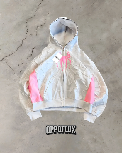White hoodie with pink accents on a concrete surface, featuring the brand 'Oppoflux'.